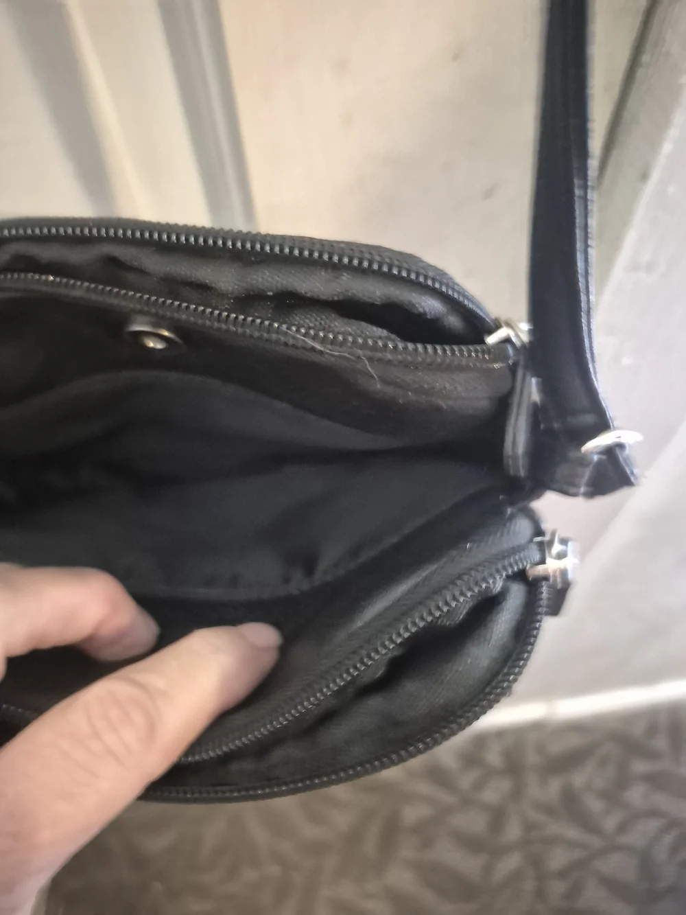 MultiSac Black Leather Crossbody Bag - Polished Logo Accent